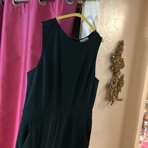 Jumpsuit with front leg pleats and front pockets!